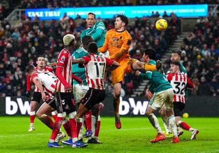 Virgil van Dijk rises highest in a crowded six-yard box to head home Liverpool’s winner past the stranded Sunderland goalkeeper, Robin Roefs