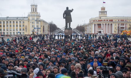 People rally in central Kemerovo in the aftermath of the fire
