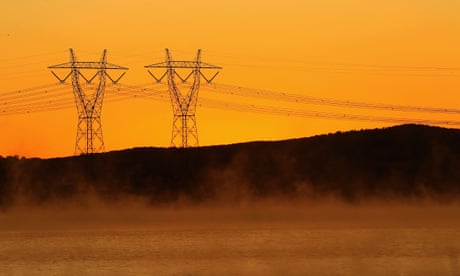 Power lines in early morning fog