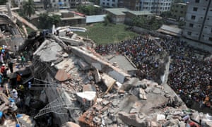 Rescuers in 2013 gather at the collapsed eight-storey Rana Plaza garment building, near Dhaka, Bangladesh.