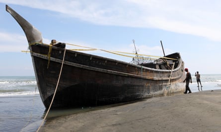 A Rohingya refugee boat beached in Indonesia in December. Up to 400 people are estimated to have died making sea crossings in the region in 2022.
