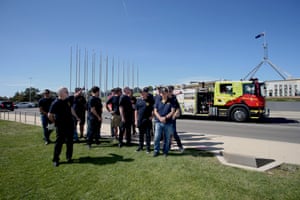 The United Firefighters Union of Australia holds a demonstration calling for a national approach to fire fighting as the climate crisis hits on the front lawns of Parliament House, Canberra, on Thursday