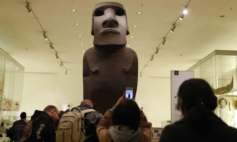An ancestor figure ‘moai’ known as Hoa Hakananai’a stands at the entrance to the Wellcome gallery in the British Museum in London.