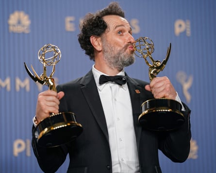 Matthew Rhys with his awards.