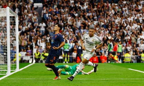 European football: Mbappé double helps Real Madrid keep Barcelona in sights