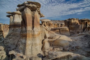 The surreal landscape of Bisti/De-Na-Zin Wilderness The 4,920-hectare Bisti/De-Na-Zin Wilderness in New Mexico, a remote and desolate area of steeply eroded badlands in the Four Corners region - where Arizona, New Mexico, Utah and Colorado intersect