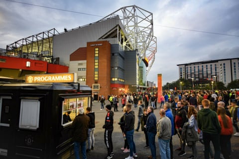 Manchester United fans arrive at Old Trafford for the Carabao Cup third-round match against Rochdale in September 2019.