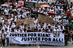 The funeral of 17-year-old schoolboy Kian Loyd delos Santos, shot dead by police, turned into of the biggest demonstrations yet against brutal Duterte’s policy. Photograph: Ezra Acayan/NurPhoto via Getty Images