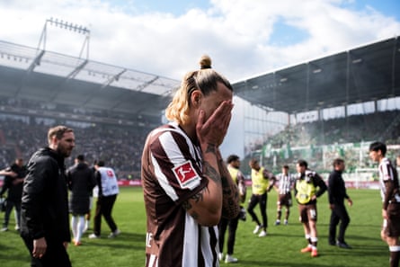 Jackson Irvine reacts after St Pauli were relegated from the Bundesliga.