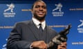 FILE - Heisman Trophy winner Reggie Bush of the University of Southern California smiles while posing for photos after a news conference in New York, Dec. 10, 2005. Reggie Bush has been reinstated as the 2005 Heisman Trophy winner, Wednesday, April 24, 2024, more than a decade after Southern California returned the award following an NCAA investigation that found he received what were impermissible benefits during his time with the Trojans.(AP Photo/Frank Franklin II, File)