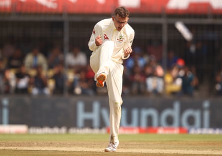 Todd Murphy celebrates taking the wicket of Virat Kohli.