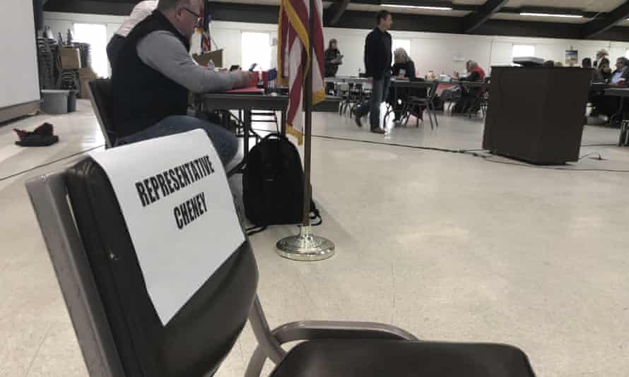 An empty chair labeled “Representative Cheney” sits in front of a meeting room in Rawlins, Wyoming., Saturday, February 6, 2021