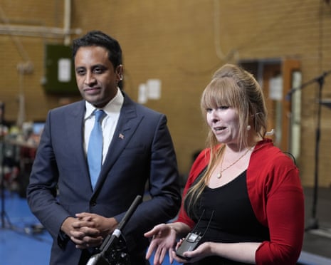 Cymru deputy leader Delyth Jewel, right, and Reform UK head of policy Zia Yusuf doing media interviews during the count