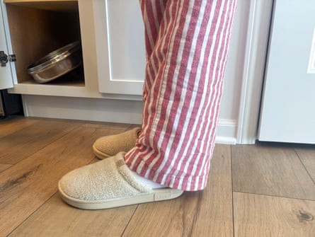 A person wearing a pair of Brunch Essential Slippers