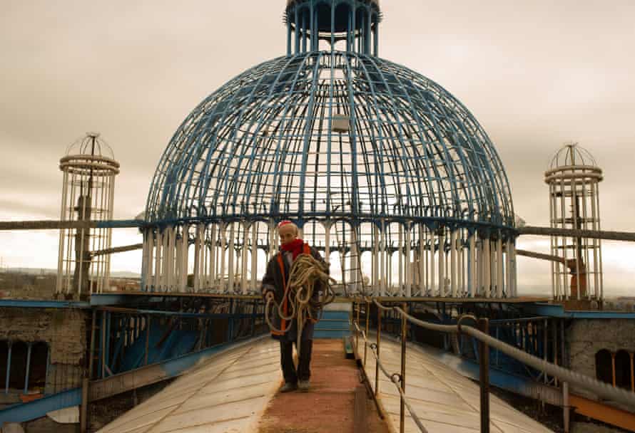 Justo Gallego collects a rope from the unfinished dome of his self-built cathedral on January 21, 2014 in Mejorada del Campo, Spain. 