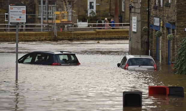 Flood water covers roads and car parks in Mytholmroyd, West Yorkshire.