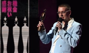 Rapper Aitch collects the first award of the night for best hip-hop/grime and rap act