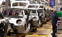 bodyshells of Mini models under construction on the production line at the BMW factory in Oxford