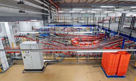 An automated bagging station at Ocado's Erith warehouse