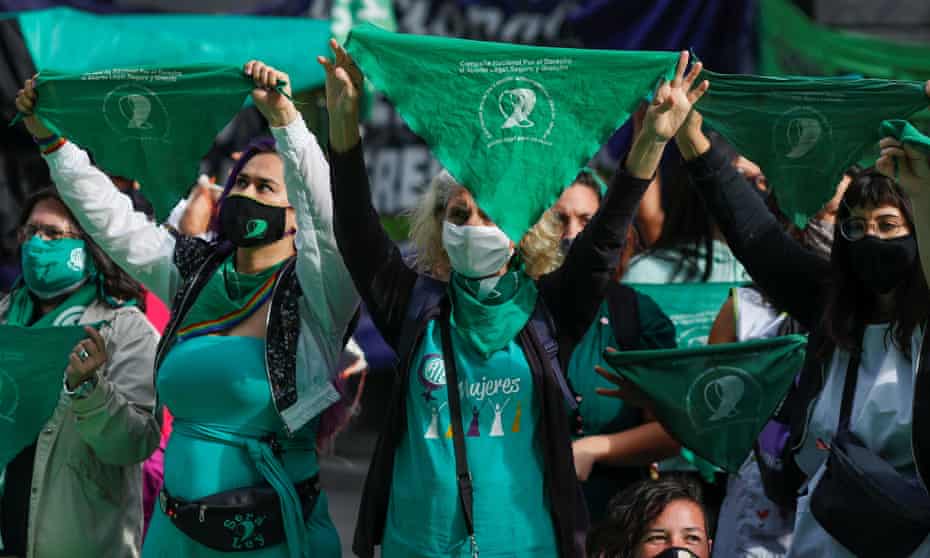 Activists hold green handkerchiefs, a symbol of the pro-abortion movement, during a demonstration in Buenos Aires, Argentina.