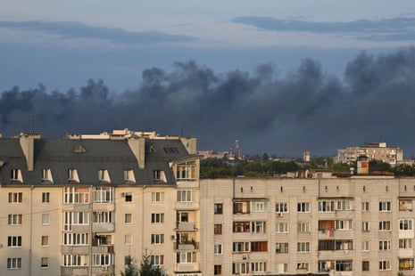 Black smoke can be seen drifting across the Lviv skyline.
