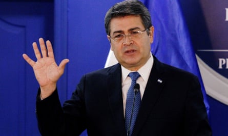 man in a suit and tie speaking