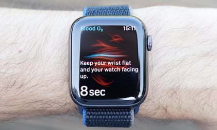 A photograph showing the blood oxygen saturation measurements readings from the new Apple Watch. It requires you to be still with your arm flat on a table for 15 seconds for reliable readings.