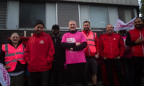 Members of the CWU attend the picket line at Camden delivery office on October 1, 2022 in London.