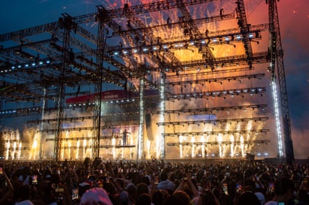 Drake performing with fireworks going off at the back of the stage