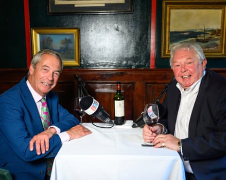 Nigel Farage being interviewed by LBC's Nick Ferrari in Farage On the Record sharing a bottle of red wine
