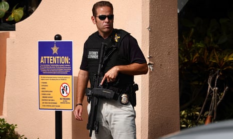 A Secret Service agent stands outside of Mar-a-Lago in Florida.