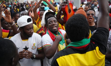 Ghana fans celebrate the arrival of their national team squad to Qatar.