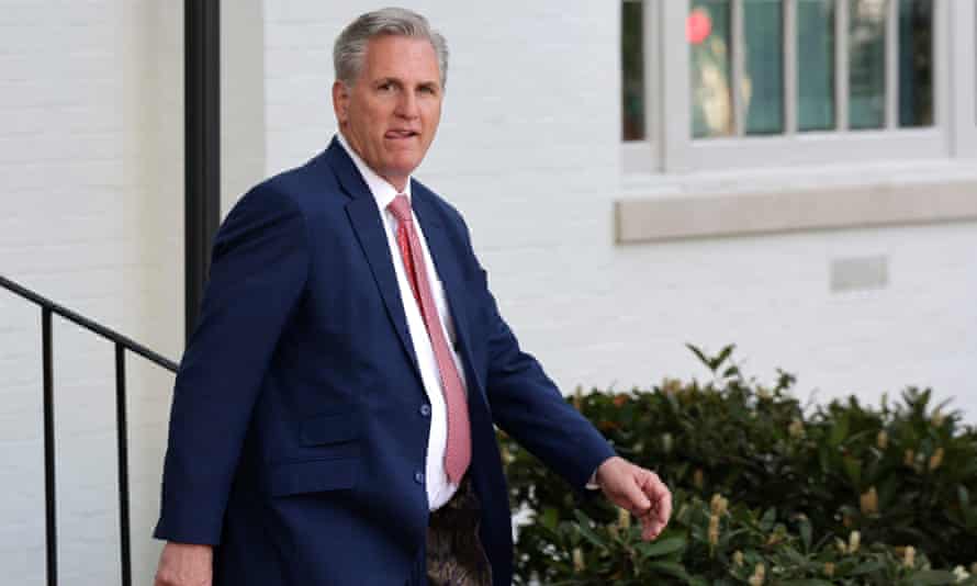 Kevin McCarthy leaves the Republican House caucus meeting at which he received “a standing ovation”.