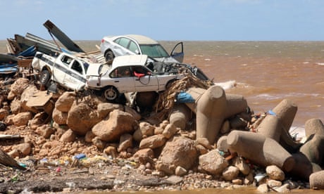 Cars piled up atop wave breakers and the rubble of a building destroyed in flash floods after the Mediterranean storm, also known as a ‘medicane’, Daniel hit Libya's eastern city of Derna.