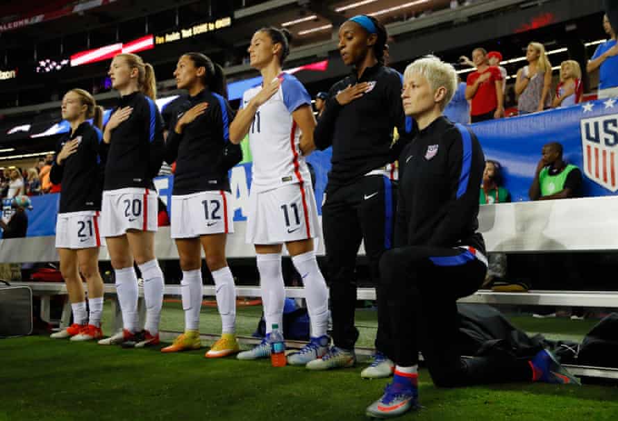 Rapinoe kneels during the national anthem before the match between the United States and the Netherlands at Georgia Dome on 18 September 2016.