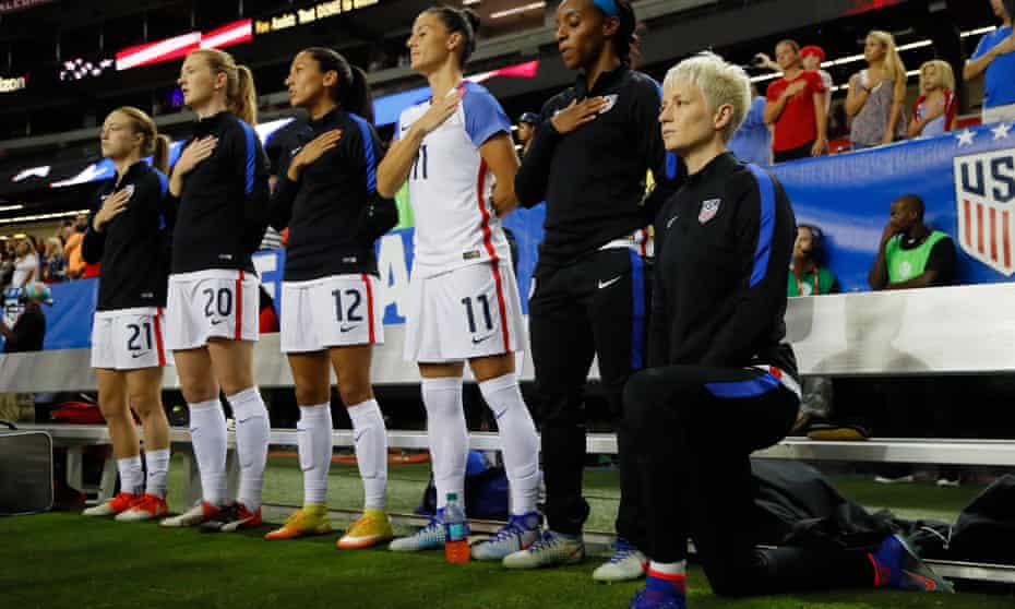 Megan Rapinoe kneels during the national anthem prior to a match between the United States and the Netherlands in 2016