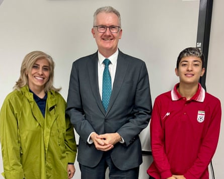 Tony Burke with members of the Iranian football team members who have sought asylum in Australia on Tuesday.