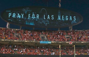 A message on a video board during a moment of silence before Kansas City Chiefs’ NFL game against Washington Redskins in Kansas City, Missouri