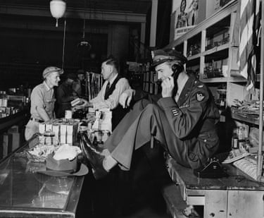Jimmy Stewart talking behind counter at his father’s hardware store, Indiana, 1945, Peter Stackpole