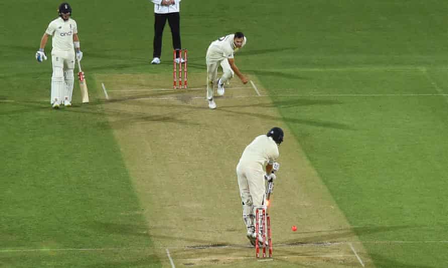 England collapse again in fifth Test as Australia ease to 4-0 Ashes series win | Ashes 2021-22 2 Australia’s Scott Boland (top) bowls Joe Root under the lights.