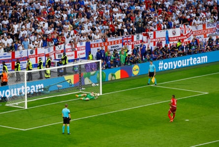 Switzerland’s Manuel Akanji has his shot saved by England’s Jordan Pickford during the penalty shootout
