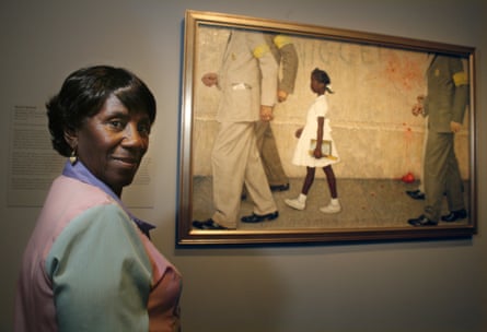 Ruby's mother, Lucille, next to the Norman Rockwell painting The Problem We All Live With.