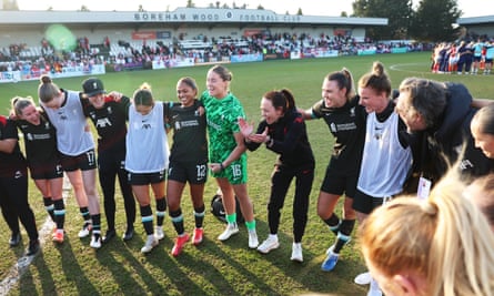 Amber Whiteley leads a huddle with her Liverpool players after their defeat of Arsenal in the FA Cup quarter-final match