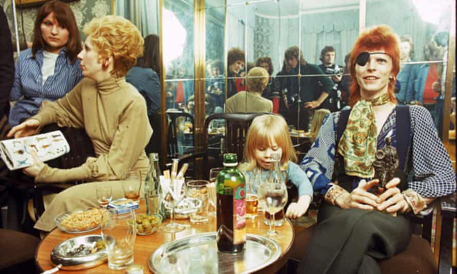 Angie Bowie, Zowie Bowie (now Duncan Jones) and David Bowie in Amsterdam, 1974.