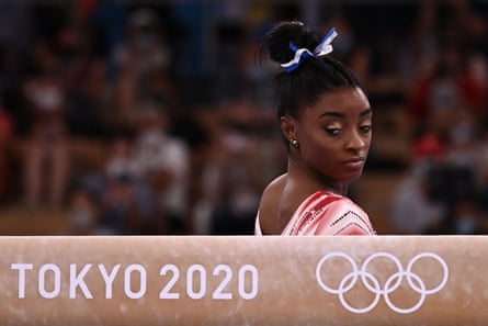 Simone Biles gets ready to compete in the artistic gymnastics women’s balance beam final in Tokyo