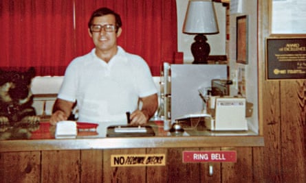 Gerald Foos at the reception desk of his motel in Colorado.