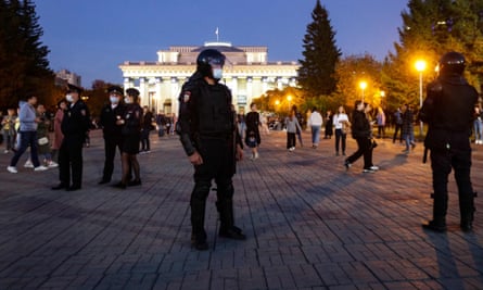 Police officers in Novosibirsk following calls for people to protest against partial mobilisation.