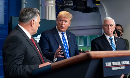 Donald Trump turns to the homeland security official William Bryan during the briefing at which the president extolled the virtues of ingested disinfectant.