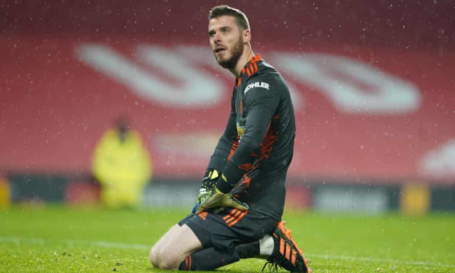 The Manchester United goalkeeper, David De Gea, on his knees after Oliver Burke scored Sheffield United’s second goal.