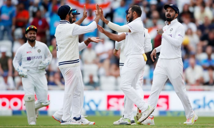 India’s Mohammed Shami celebrates taking the wicket of England’s Dan Lawrence with teammates.